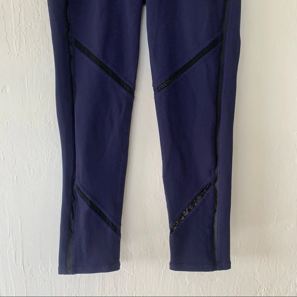 ALO Yoga Continuity Capri Legging In Rich Navy